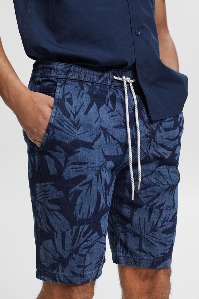 Jeansshorts med tropiskt mönster