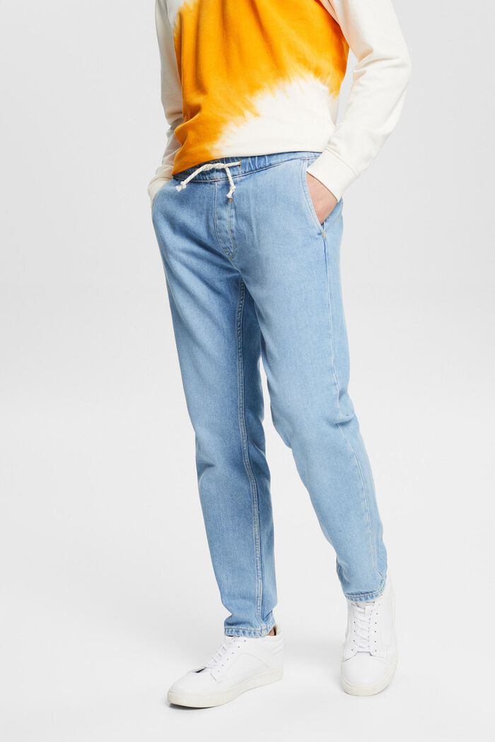 Jeans med elastisk dragskolinning